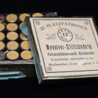 $300 - This is a German tin made by Walbinger, Meuschel & Co. out of Bischweiler. It is full of 25 blank cartridges.