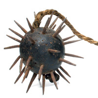 This is a Spanish style iron spiked flail that I acquired from a Peruvian art dealer.<br /><br />
  It appears to be cast grey iron which became popular in Western Europe near the late 14th century. This particular example is not quite that old and was most likely brought over to Peru by the Spaniards at least 100 years after their conquest of Peru sometime in the 17th century. The Spanish use of iron weapons was one of the biggest advantages in their conquest of the Inca Empire who mainly relied on stone and some basic bronze weapons.<br /><br />
  The cord in this example is most likely not original to the piece though it has been part of it for quite some time as evidenced by the slight oxidation that has rubbed into the cord. The balls would have originally been attached to a short chain around 8 inches long that would have been attached to the end of a longer wooden staff.<a class="macecolorred" href="../images/maces/flail.jpg">Click Here to see a larger version of this image.</a>